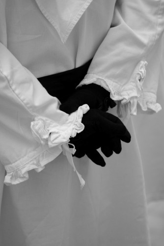 guanti bianco e nero
